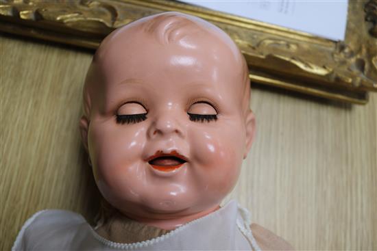 A German composition head and body doll 62cm